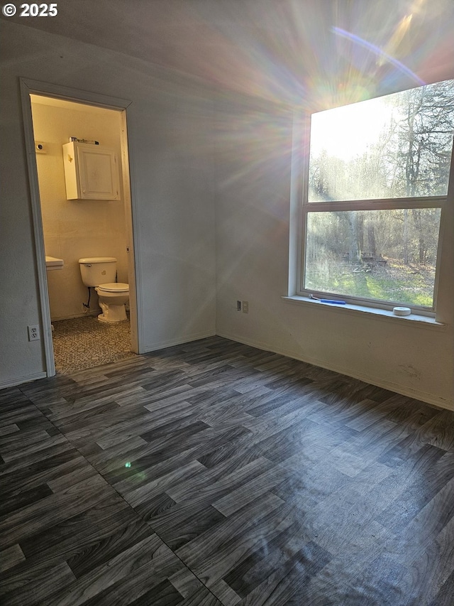 unfurnished bedroom featuring ensuite bath