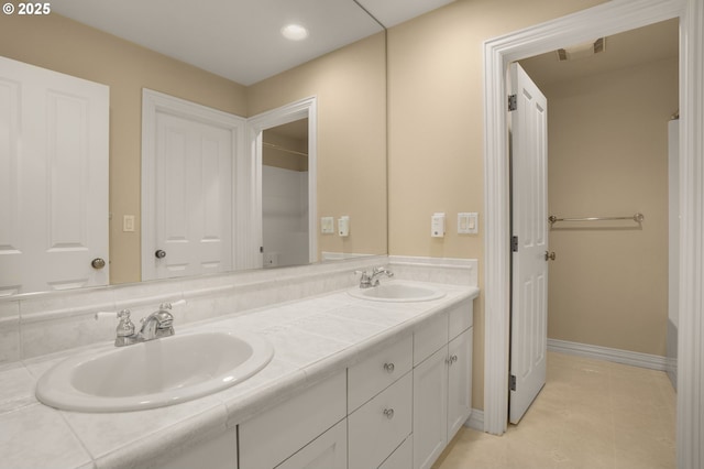7917 NW Blue Pointe Ln, Portland, OR 97229 - bathroom with double vanity and tile patterned floors