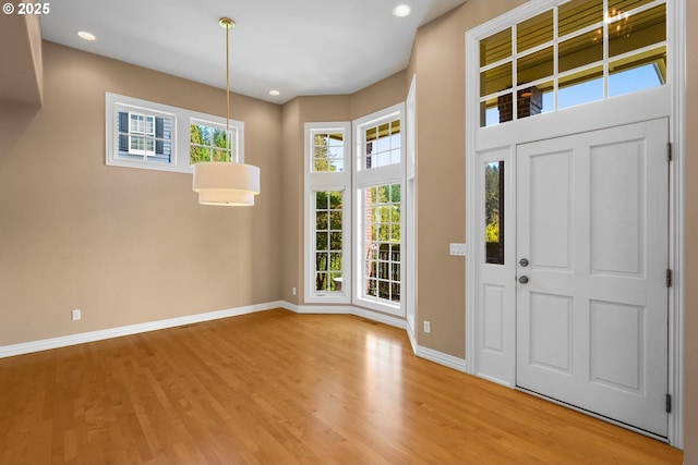 7917 NW Blue Pointe Ln, Portland, OR 97229 - entrance foyer featuring light wood-style flooring, baseboards, and recessed lighting