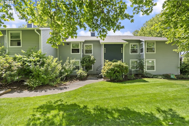 8278 SW Mohawk St, Tualatin, OR 97062 - view of front of home featuring a chimney and a front yard