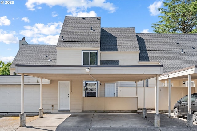 251 NE Village Squire Ave Unit 2, Gresham, OR 97030 - back of property with roof with shingles and a chimney
