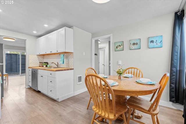 251 NE Village Squire Ave Unit 2, Gresham, OR 97030 - dining room with light wood-style floors and recessed lighting