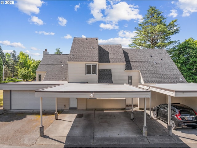 251 NE Village Squire Ave Unit 2, Gresham, OR 97030 - back of house with roof with shingles and a chimney