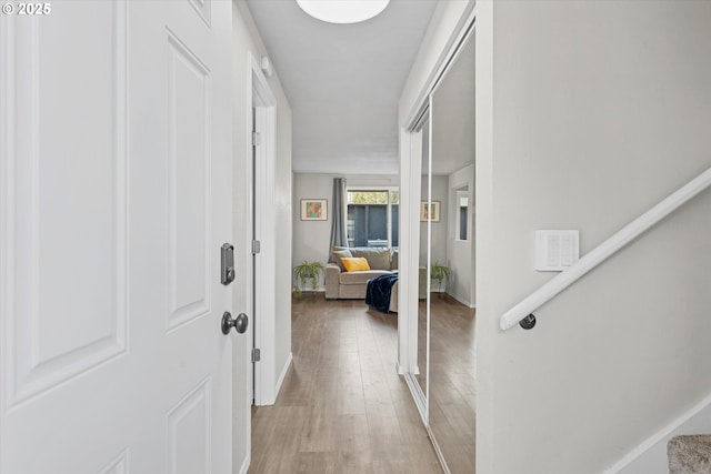 251 NE Village Squire Ave Unit 2, Gresham, OR 97030 - entrance foyer with light wood finished floors and stairs