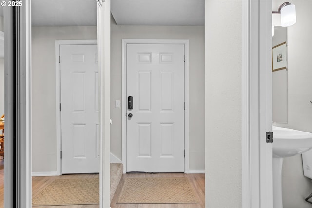 251 NE Village Squire Ave Unit 2, Gresham, OR 97030 - entrance foyer featuring light wood-style flooring