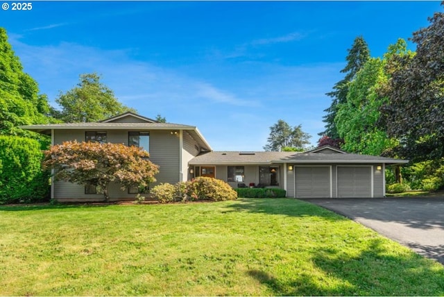 31430 NE Canter Ln, Sherwood, OR 97140 - view of front of property featuring a garage, asphalt driveway, and a front lawn