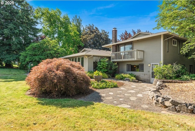 31430 NE Canter Ln, Sherwood, OR 97140 - view of front facade with a chimney, a front lawn, and a balcony