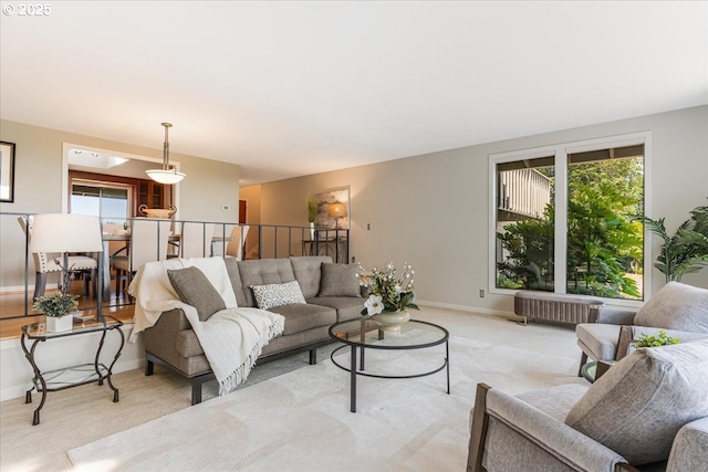 31430 NE Canter Ln, Sherwood, OR 97140 - living room featuring light carpet and radiator