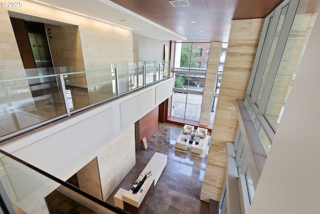 1001 NW Lovejoy St Unit 710, Portland, OR 97209 - hallway featuring recessed lighting and expansive windows