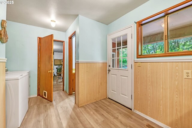 32739 Taylor Butte Rd, Cottage Grove, OR 97424 - doorway to outside featuring light wood-style flooring, washing machine and dryer, and wainscoting