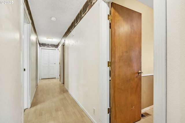 32739 Taylor Butte Rd, Cottage Grove, OR 97424 - hall featuring light wood-type flooring and baseboards