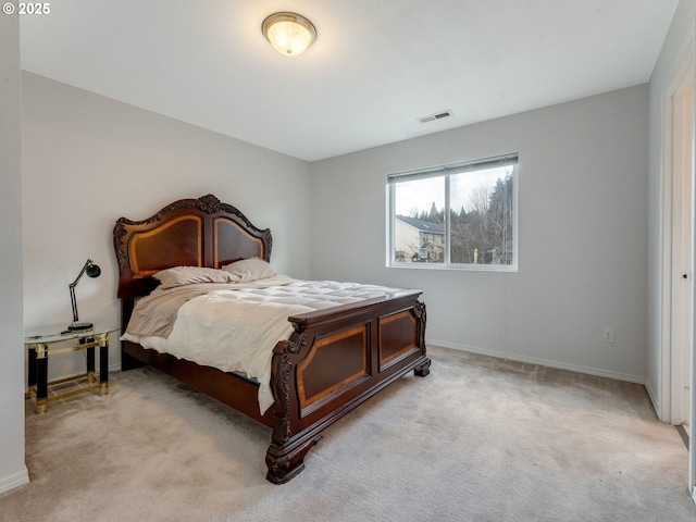 bedroom featuring carpet, visible vents, and baseboards