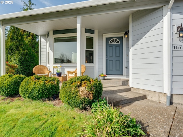 doorway to property with a porch