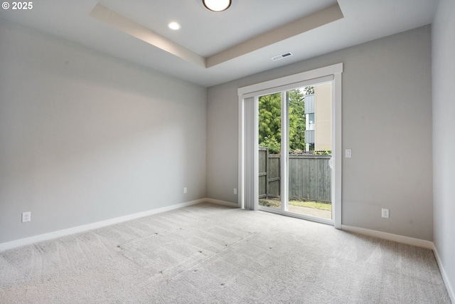 6429 SE Provence St, Hillsboro, OR 97123 - empty room featuring baseboards, carpet flooring, recessed lighting, and a raised ceiling