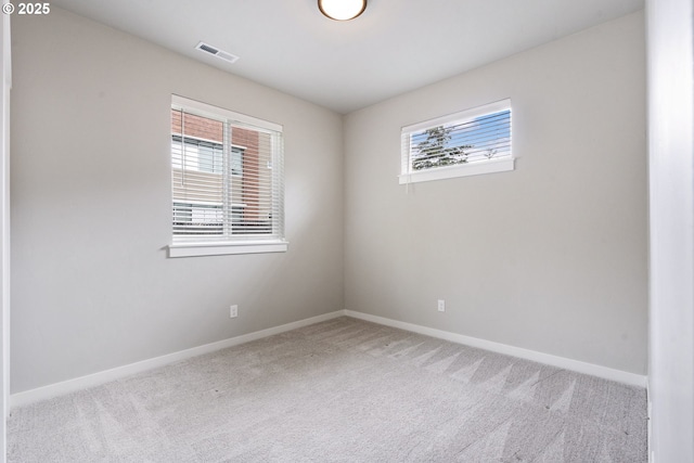 6429 SE Provence St, Hillsboro, OR 97123 - carpeted spare room featuring baseboards