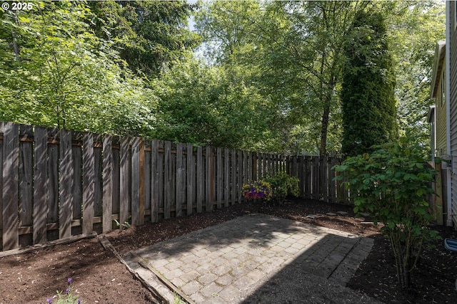 view of patio featuring a fenced backyard