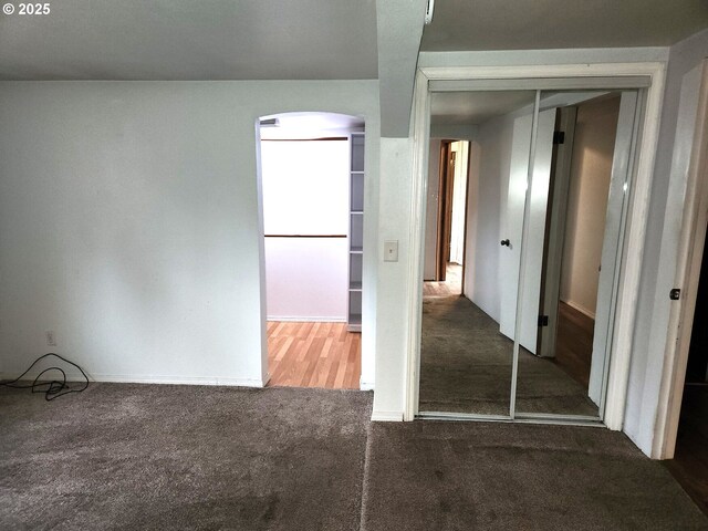 82284 Hillview Dr, Creswell, OR 97426 - empty room featuring arched walkways and carpet floors