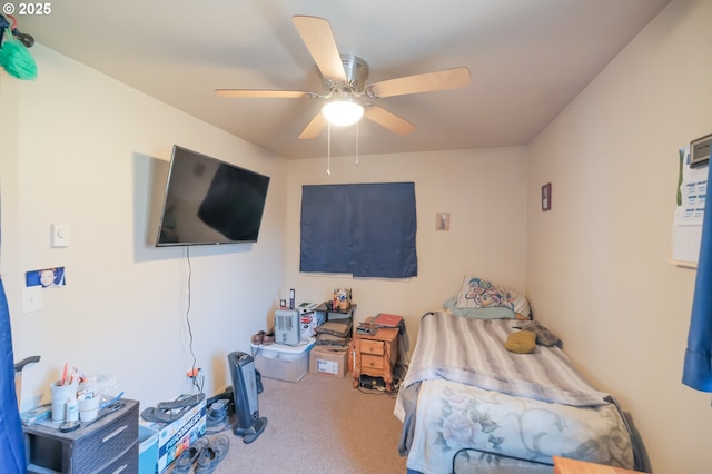 bedroom featuring ceiling fan and carpet floors