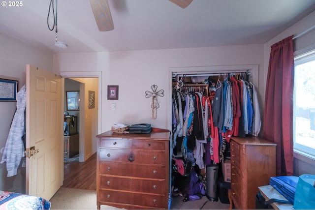 bedroom featuring ceiling fan, a closet, and light wood-type flooring