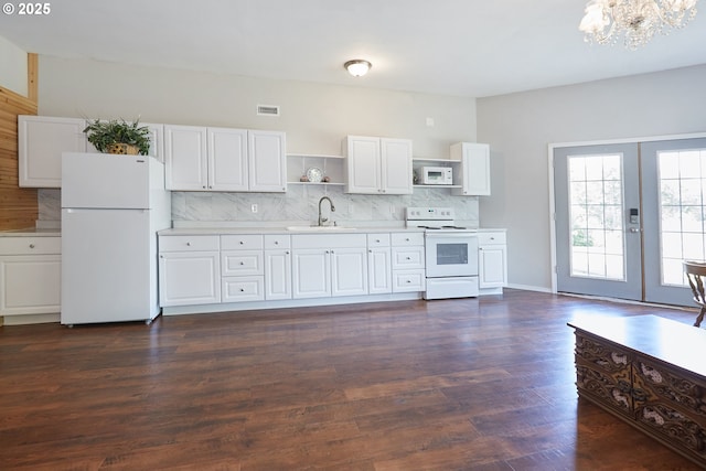 40920 NW Maple Ridge Rd, Woodland, WA 98674 - kitchen with white appliances, open shelves, light countertops, backsplash, and a chandelier