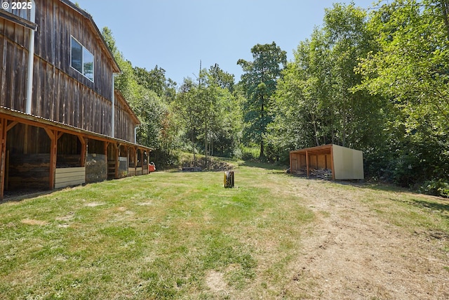 40920 NW Maple Ridge Rd, Woodland, WA 98674 - view of yard with an outdoor structure and an exterior structure