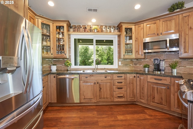 40920 NW Maple Ridge Rd, Woodland, WA 98674 - kitchen with stainless steel appliances, backsplash, dark wood-type flooring, glass insert cabinets, and recessed lighting