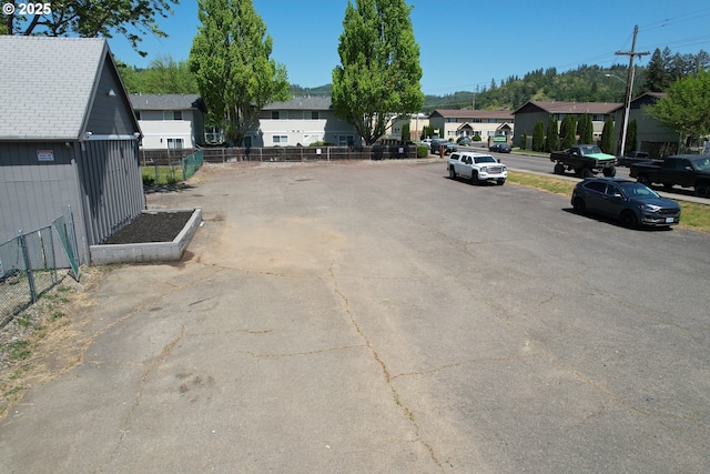 132 NE Rifle Range St, Roseburg, OR 97470 - view of asphalt street featuring a residential view and street lights
