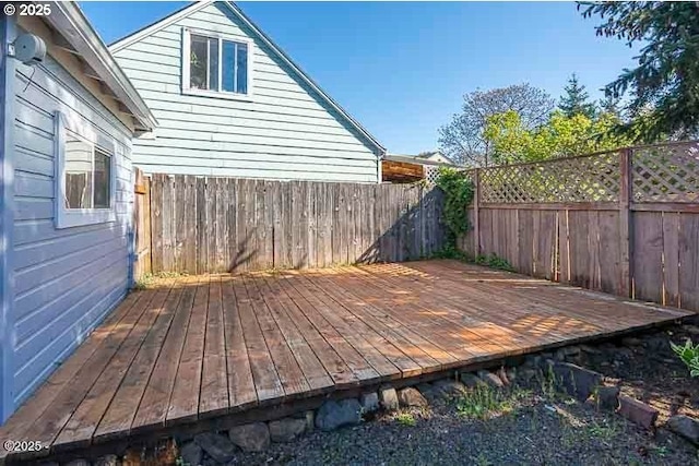 deck featuring a fenced backyard