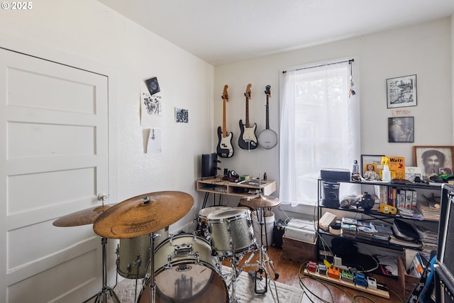 miscellaneous room with wood finished floors