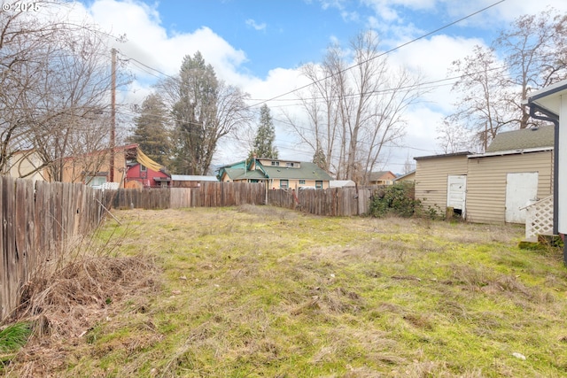 view of yard with fence