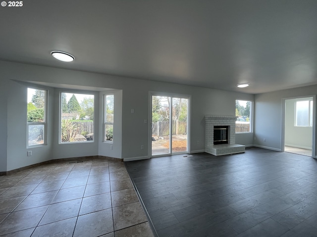 5145 Trevon St, Eugene, OR 97402 - unfurnished living room featuring a fireplace and baseboards