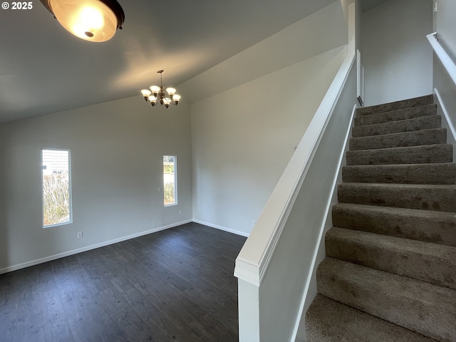 5145 Trevon St, Eugene, OR 97402 - stairs featuring vaulted ceiling, wood finished floors, and a chandelier