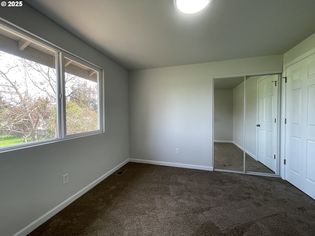 5145 Trevon St, Eugene, OR 97402 - unfurnished bedroom with carpet floors and a closet