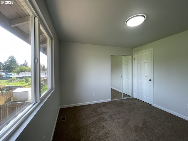 5145 Trevon St, Eugene, OR 97402 - unfurnished bedroom featuring carpet and a closet