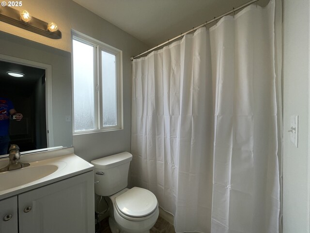 5145 Trevon St, Eugene, OR 97402 - full bathroom featuring toilet and vanity
