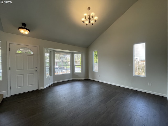 5145 Trevon St, Eugene, OR 97402 - foyer featuring a chandelier, high vaulted ceiling, and dark wood-style floors