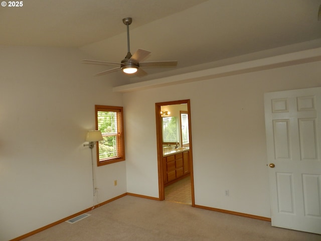 31811 NW Belgium Ct, North Plains, OR 97133 - unfurnished room with ceiling fan, light carpet, and vaulted ceiling