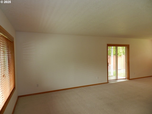 31811 NW Belgium Ct, North Plains, OR 97133 - carpeted empty room with baseboards