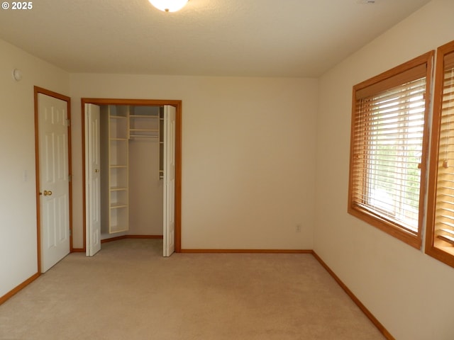 31811 NW Belgium Ct, North Plains, OR 97133 - unfurnished bedroom featuring light colored carpet and a closet