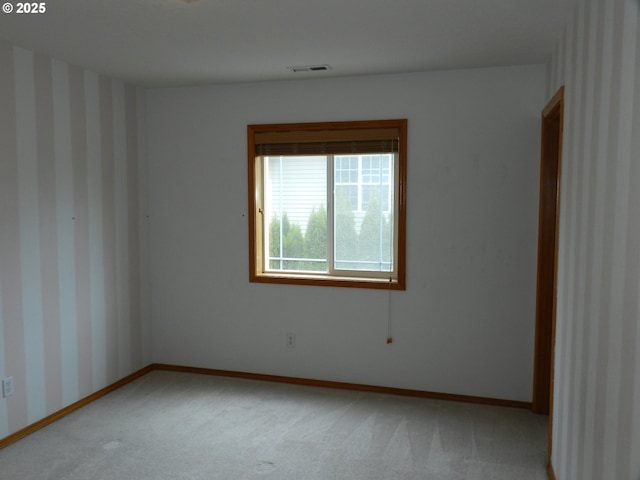 31811 NW Belgium Ct, North Plains, OR 97133 - spare room featuring light carpet and wallpapered walls