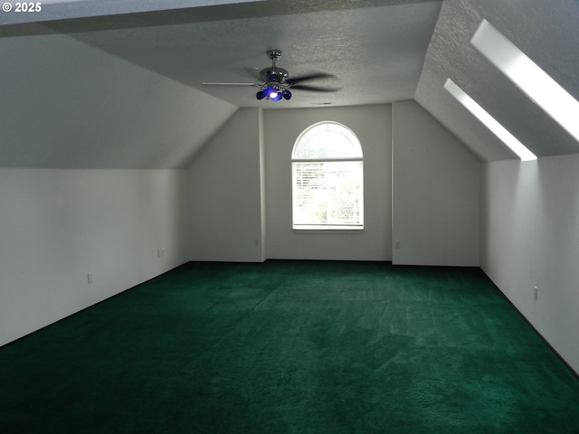 31811 NW Belgium Ct, North Plains, OR 97133 - bonus room with vaulted ceiling, carpet flooring, ceiling fan, and a textured ceiling