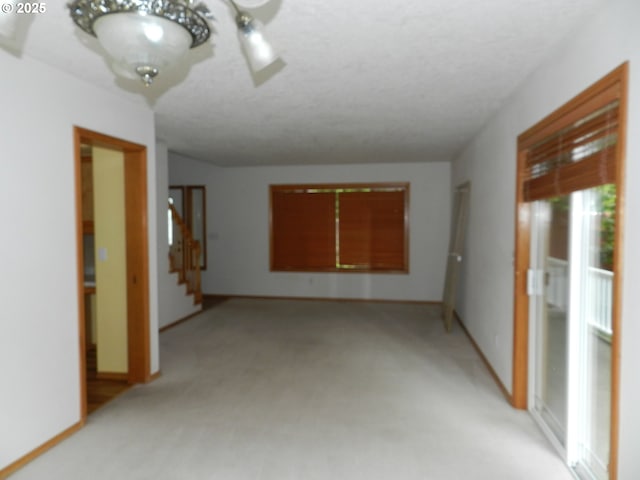 31811 NW Belgium Ct, North Plains, OR 97133 - unfurnished room featuring light colored carpet and stairs