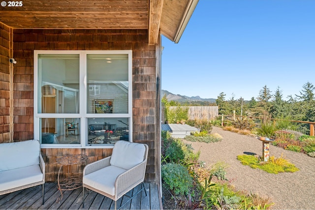 balcony featuring a mountain view