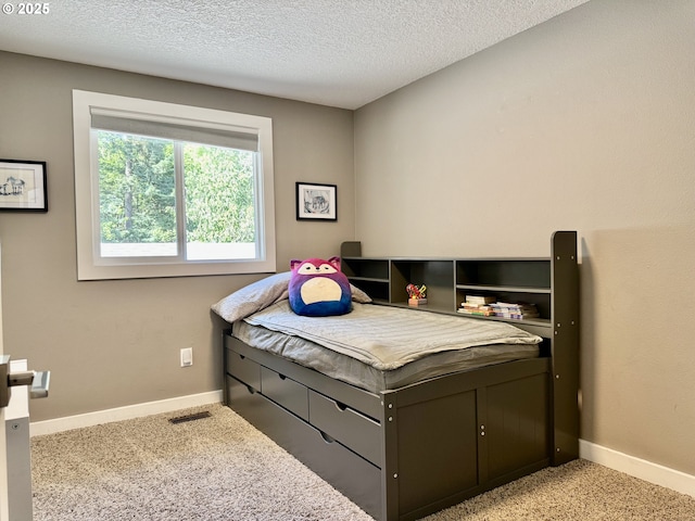 24035 SW Mountain Creek Rd, Sherwood, OR 97140 - bedroom featuring light colored carpet, baseboards, and a textured ceiling