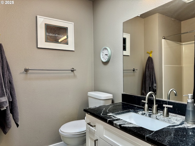 24035 SW Mountain Creek Rd, Sherwood, OR 97140 - full bathroom with vanity, toilet, and a textured wall