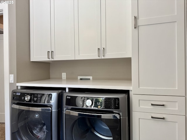 24035 SW Mountain Creek Rd, Sherwood, OR 97140 - laundry room featuring cabinet space and washing machine and clothes dryer