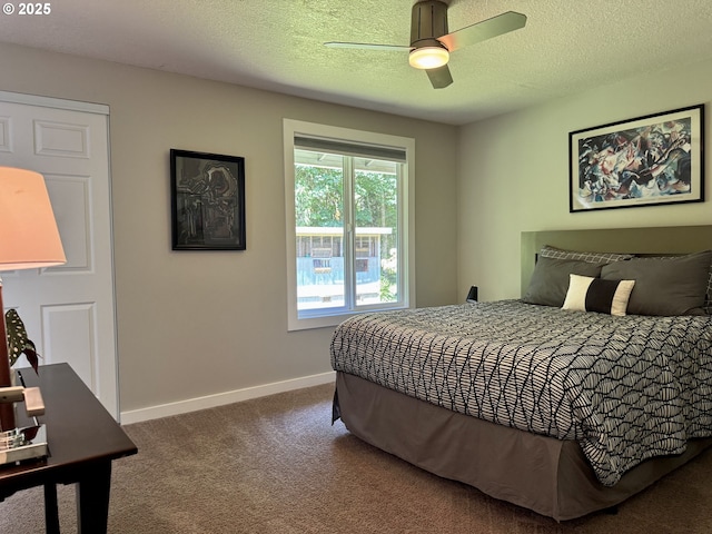 24035 SW Mountain Creek Rd, Sherwood, OR 97140 - carpeted bedroom with baseboards, a textured ceiling, and ceiling fan