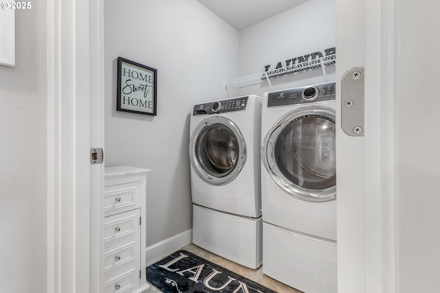 52152 Casswell Dr, Scappoose, OR 97056 - laundry room featuring washer and dryer and baseboards