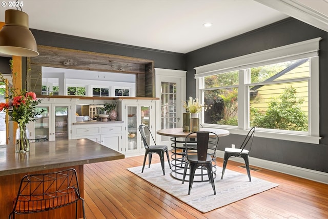 4000 NE Hassalo St, Portland, OR 97232 - dining space featuring light wood finished floors, french doors, baseboards, and recessed lighting