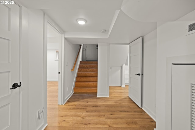 4000 NE Hassalo St, Portland, OR 97232 - hall featuring light wood-style flooring, baseboards, and stairway